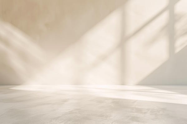 empty abstract background in neutral beige colors for business product presentation. geometrical shadows on wall for modern minimalist mockup backdrop.